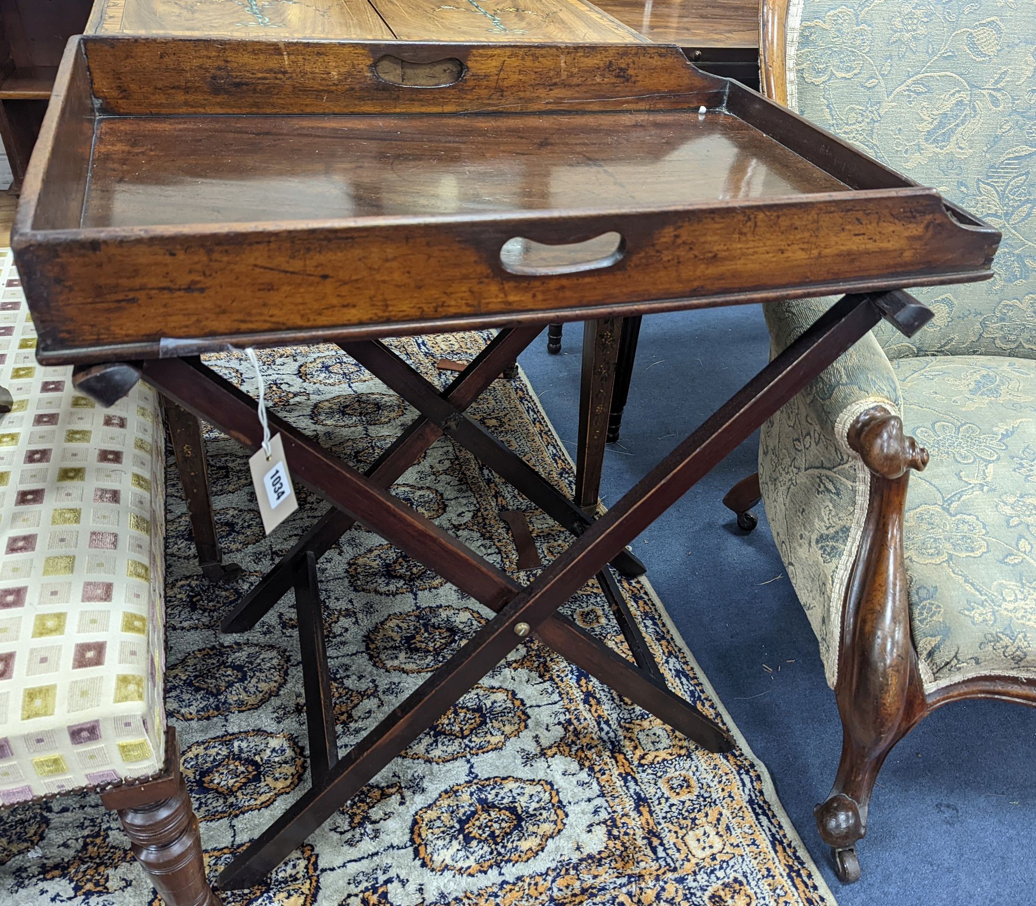 A Victorian rectangular mahogany butler's tray on folding stand, width 74cm, depth 50cm, height 78cm